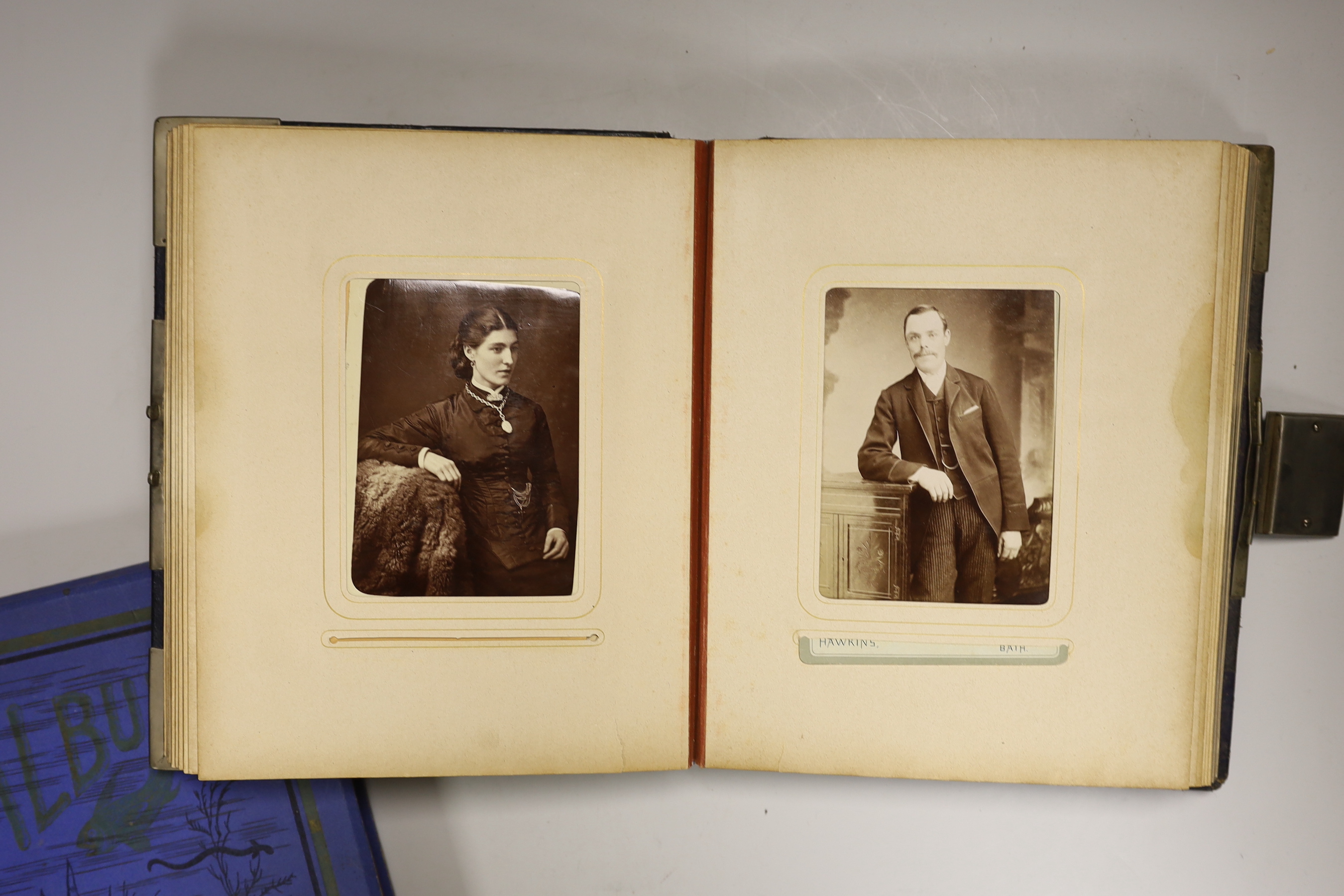 A Victorian photograph album and contents together with an Edwardian scrap book (2)